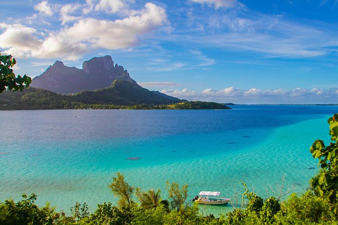 Bora Bora Combo Tour: Lagoon Cruise and 4WD Tour Including Snorkeling - Afternoon lagoon cruise: how the ray and shark moments work