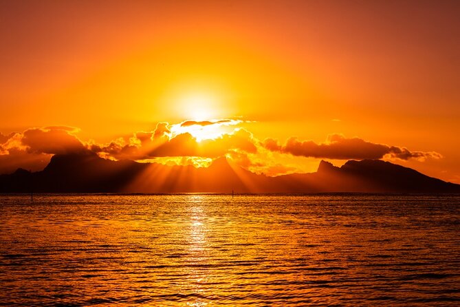 Moorea Sunset Boat Trip - Cocktails, bottled water, and local legends on the yellow boat