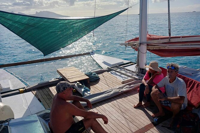 Sunset sailing trip on the Lagoon of Tahiti - Snacks, spring water, and that local punch at the end