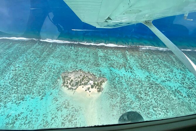 Tahiti: Full Day Tour with Private Flight EN Cessna (Moorea & Tahiti) - The private flight over Moorea: Cessna 172 windows, lagoon shapes